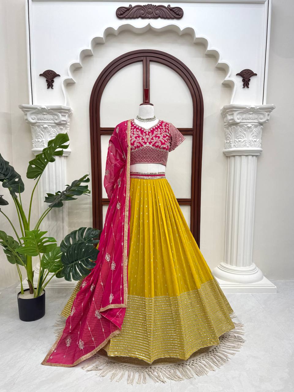 Vibrant Sunshine Yellow and Fuchsia Pink Designer Lehenga Choli with Dazzling Shimmer Embellishments